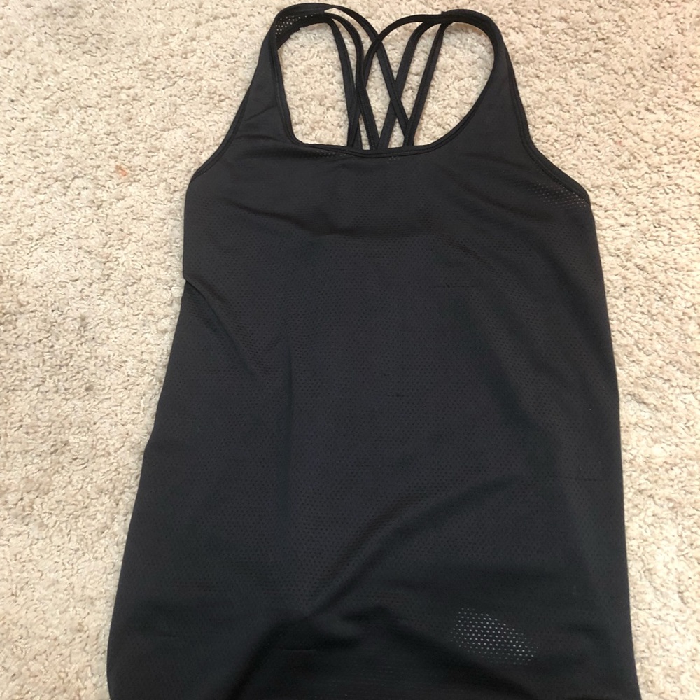 Victoria’s Secret tank top.